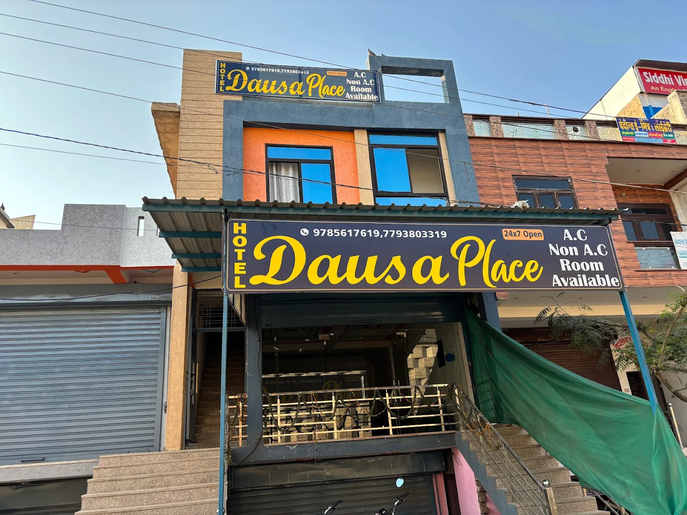 Hotel Dausa Place logo